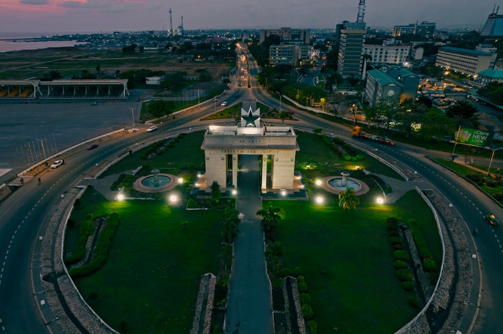 Aerial view of Independence Arch in Accra, Ghana at dusk.